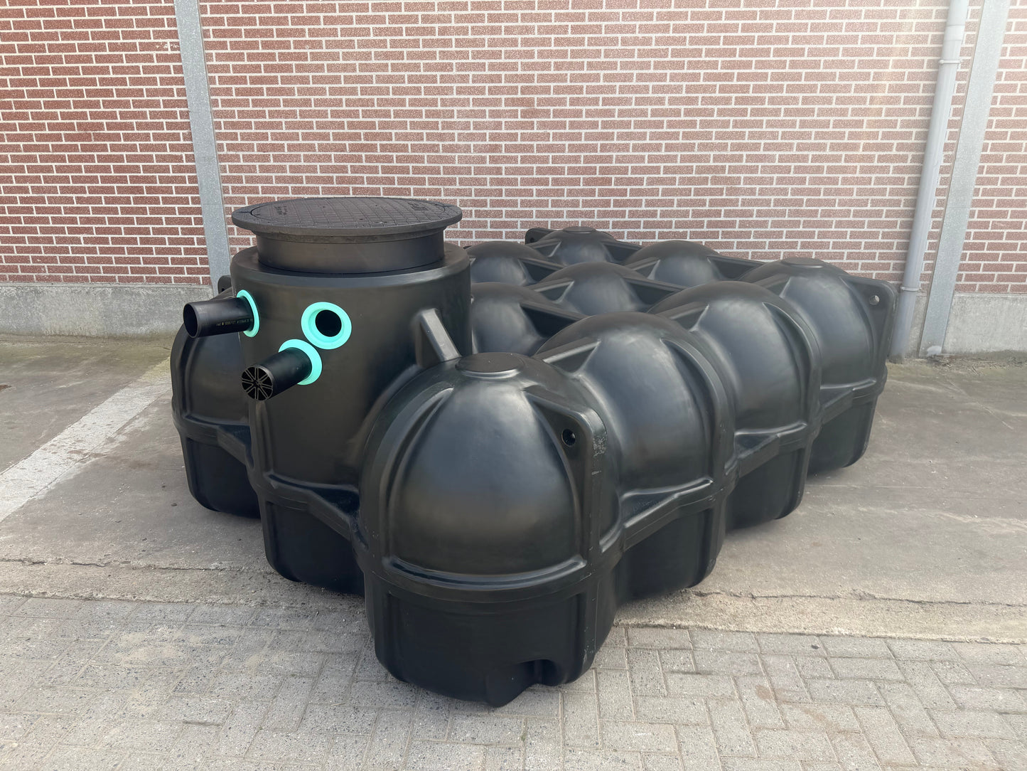 Installatie regenwaterput woningpakket 10000L